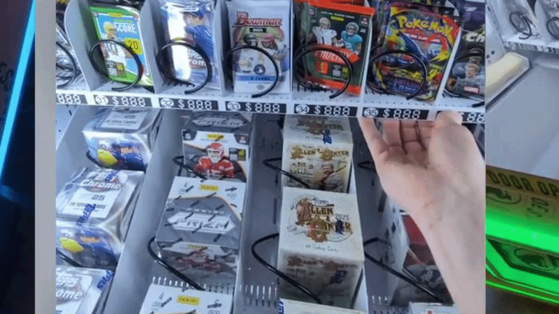 Vending machine interior with sports and Pokémon card packs